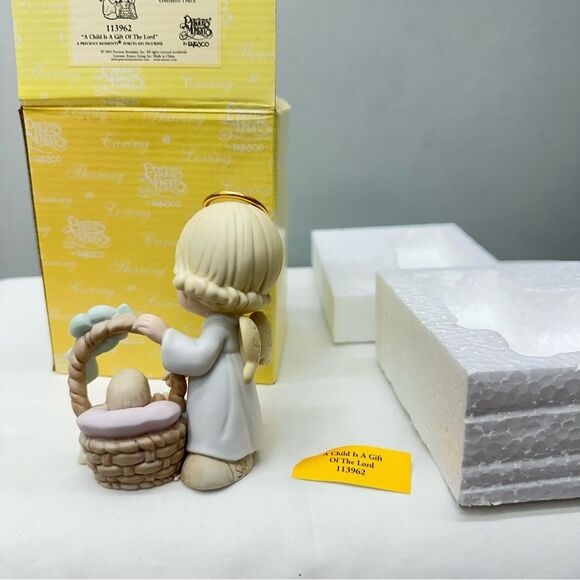 NIB Precious Moments a child is a gift of the Lord porcelain figurine. - Picture 2 of 4